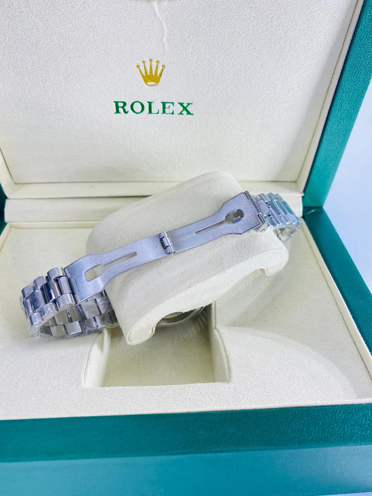 Rolex– Green Dial Diamond Edition
